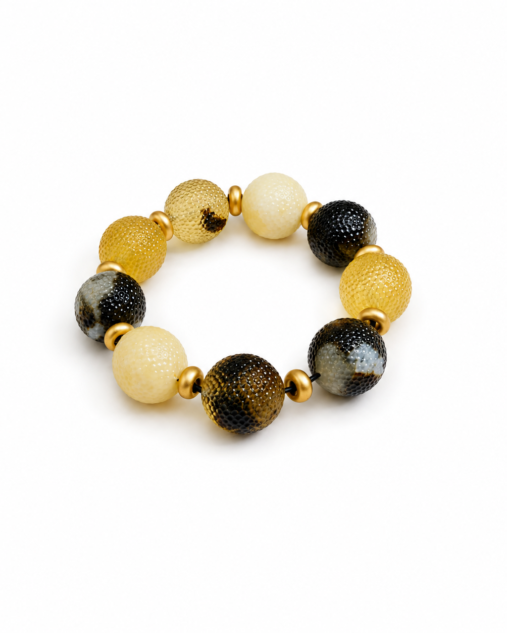 Solène Baltic amber bracelet in white and black amber — handcrafted in Lithuania by AMBER999
— Baltic amber jewellery handcrafted in Lithuania