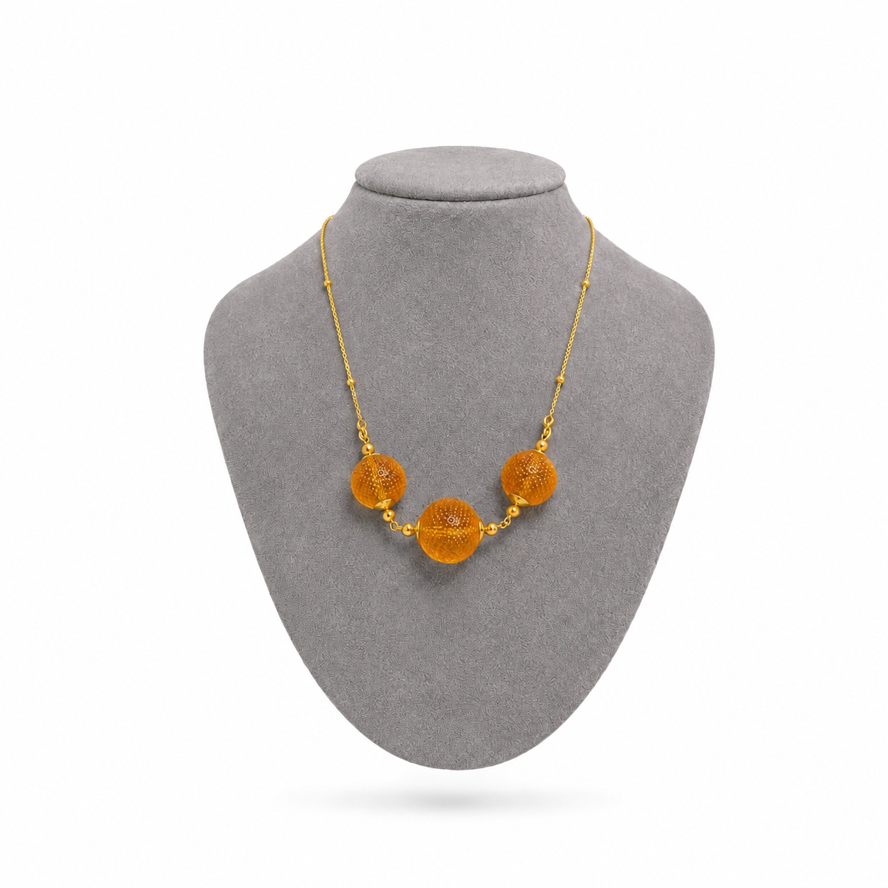 Model wearing Penete Baltic amber necklace in cognac amber — handcrafted in Lithuania by AMBER999
— Baltic amber jewellery handcrafted in Lithuania
