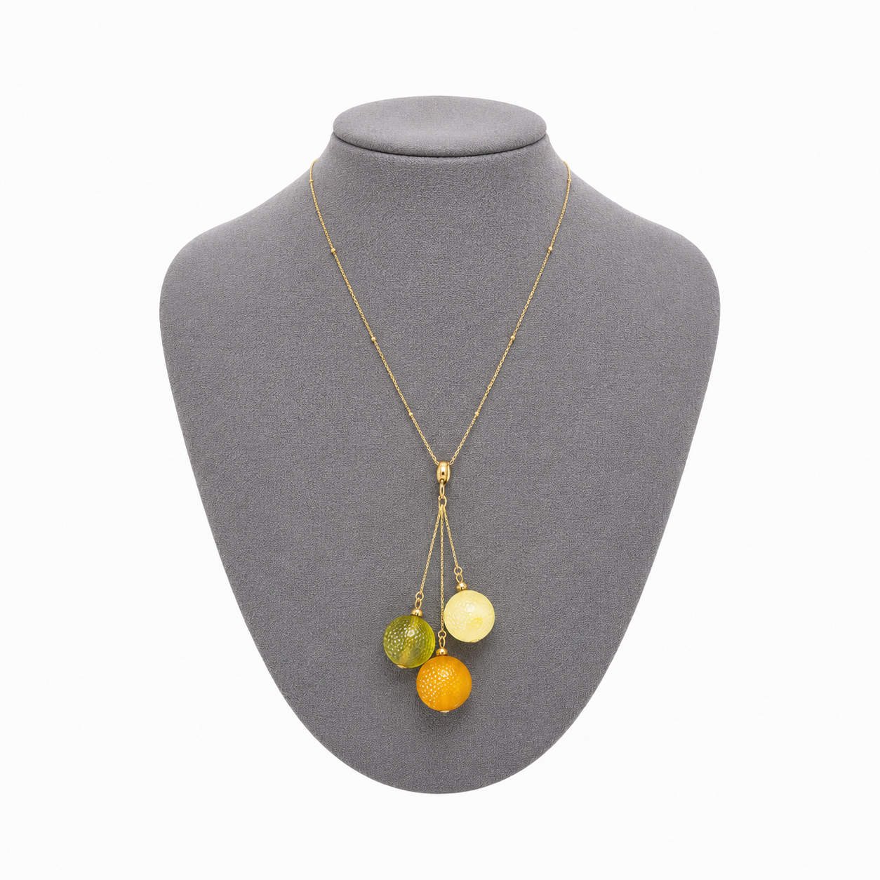 Model wearing Sidonie Baltic amber pendant necklace in cognac and cream amber — handcrafted in Lithuania by AMBER999
— Baltic amber jewellery handcrafted in Lithuania
