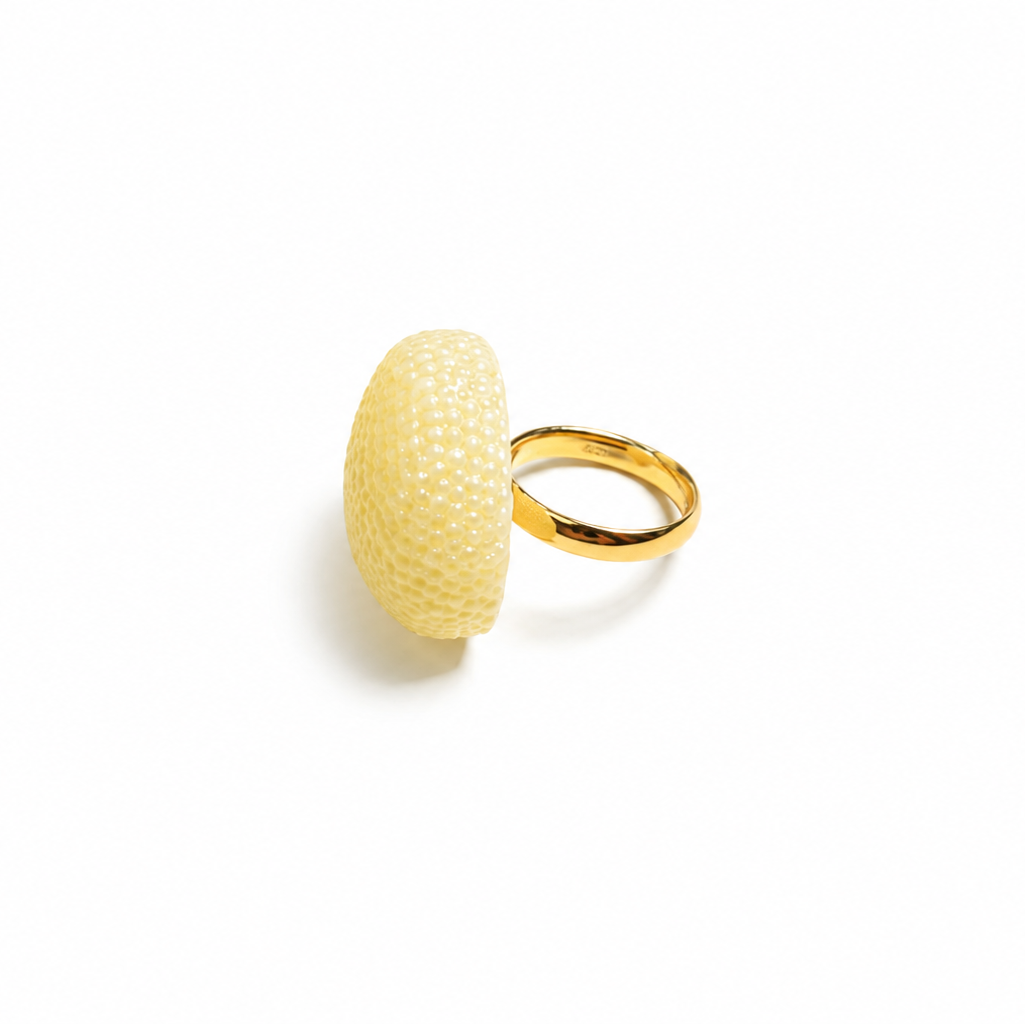 Lilou Baltic amber ring in lemon yellow amber, side view showing textured stone — handcrafted in Lithuania by AMBER999